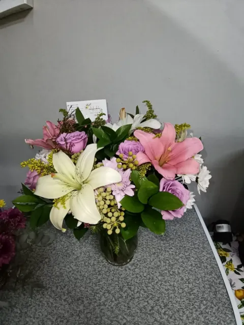 Lillies and Roses in a vase